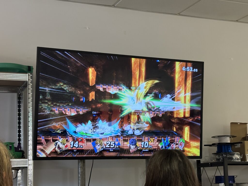 A picture of the screen featuring the first round of Smash Ultimate tournament